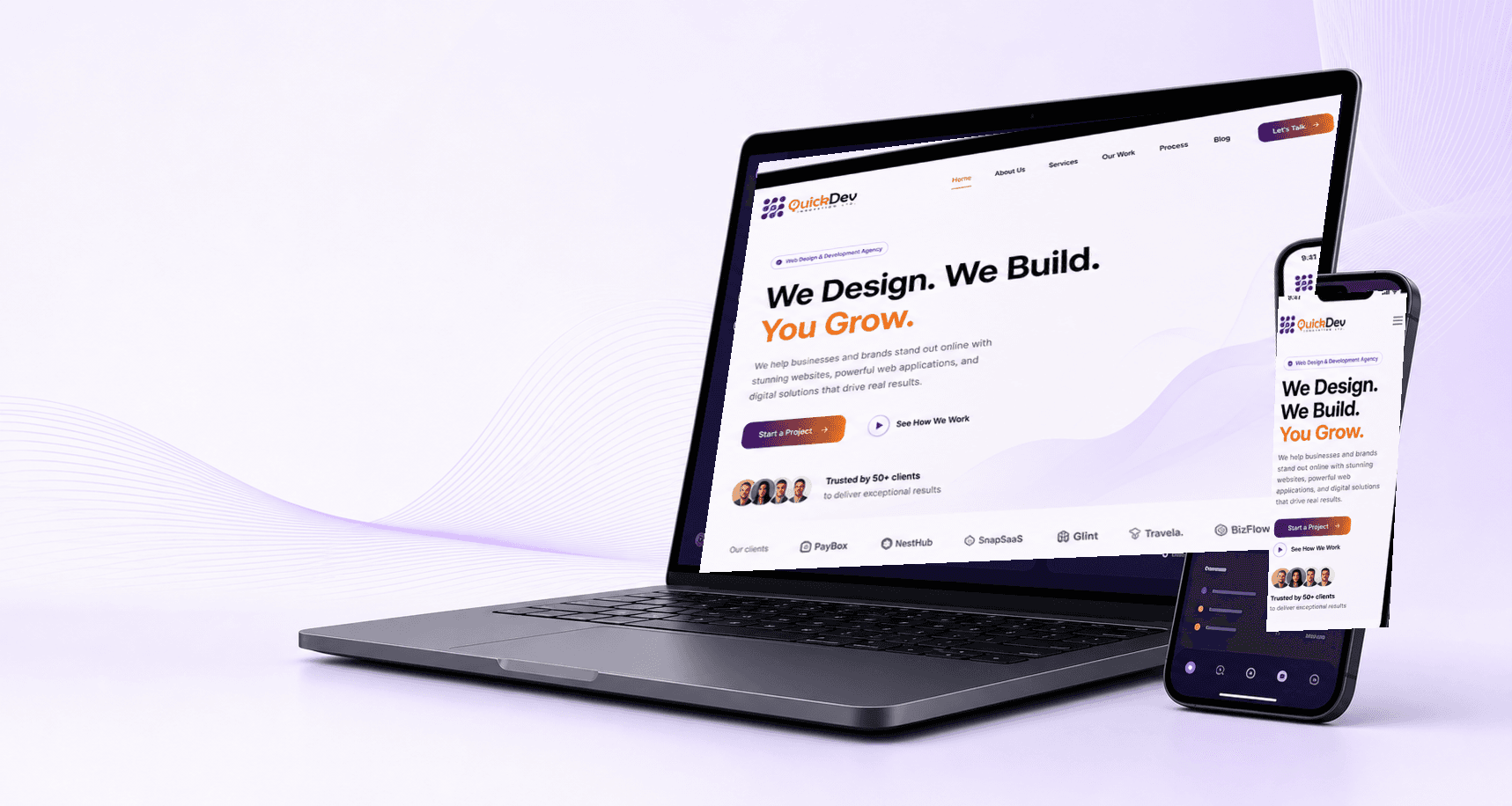 Laptop and phone displaying a responsive agency website